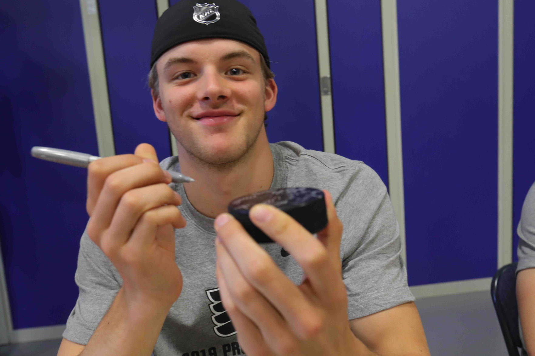 Philadelphia Flyers prospects sign autographs and play volleyball